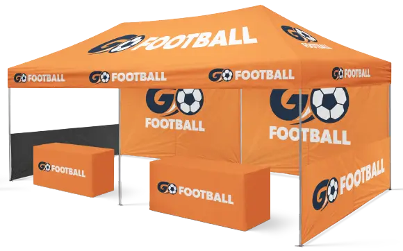 Bright orange GO Football promotional tent with logo, two counter tables, and open side for event setup